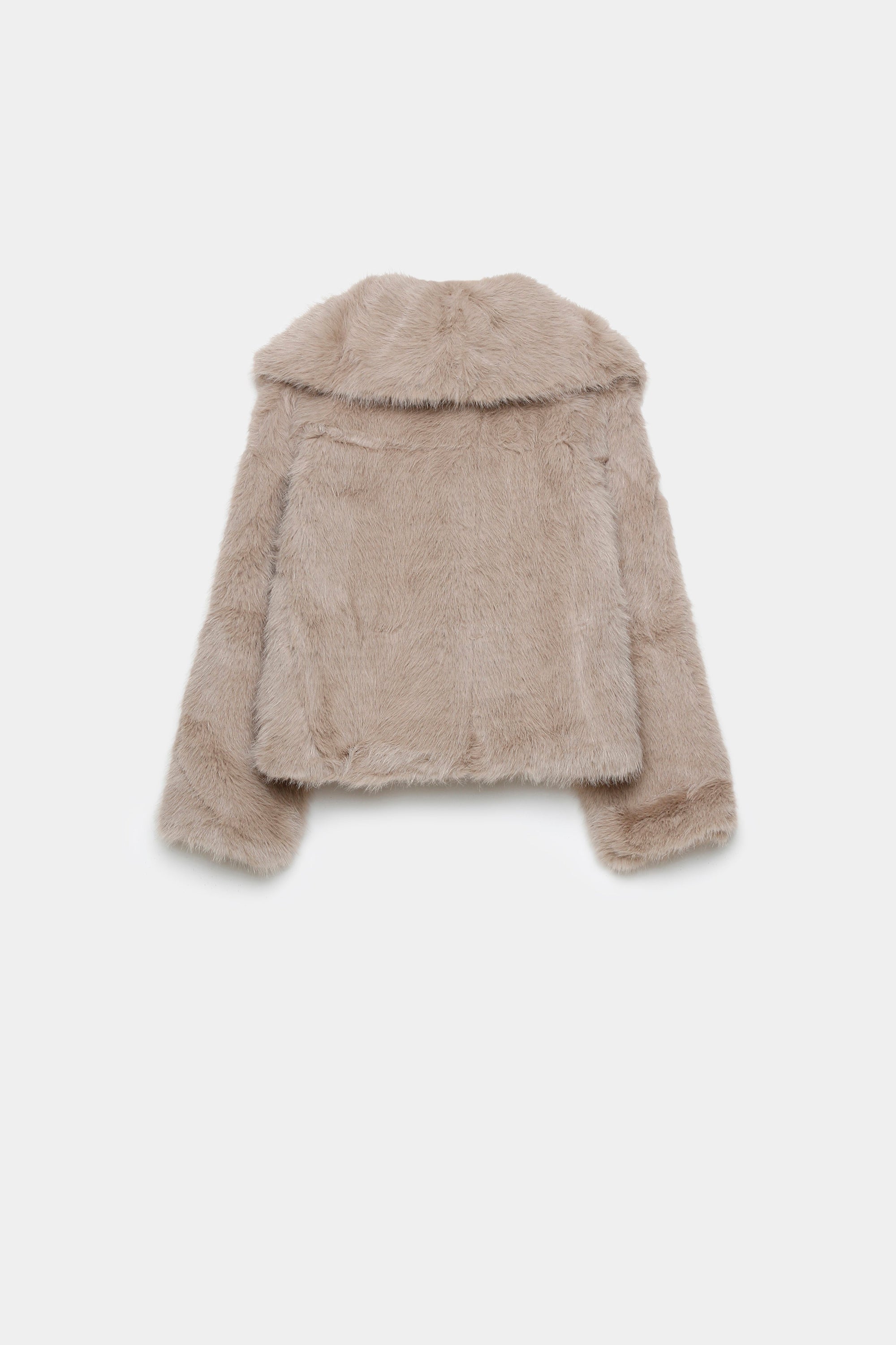 Veste en fausse fourrure élégante pour femme – Coupe courte, vue arrière beige, idéale pour un style raffiné en hiver. Veste fausse fourrure stylée.