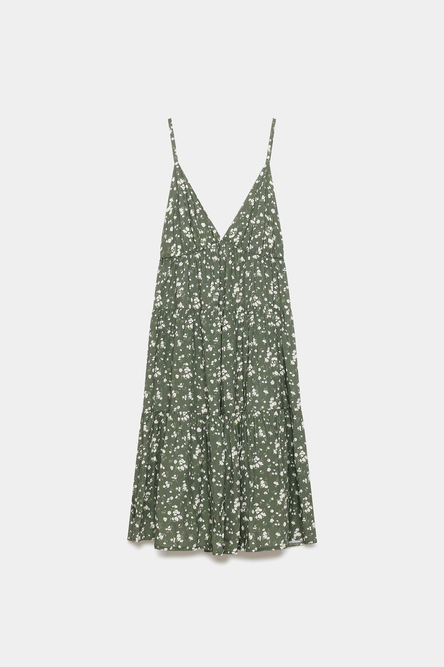 Robe fluide en viscose à bretelles fines, vue de face, style minimaliste, avec un motif floral sur fond olive.