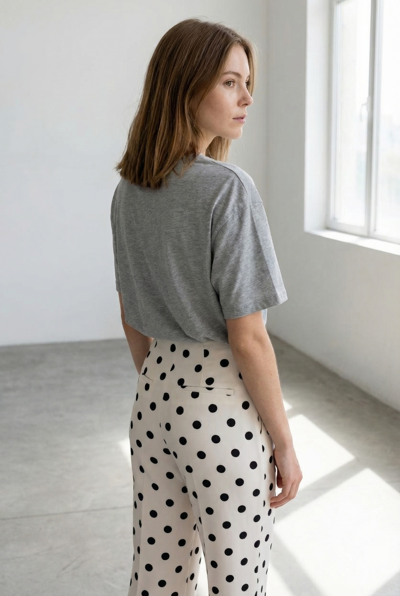 Pantalon fluide à pois noir blanc taille haute
