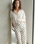 Pantalon fluide à pois noir blanc taille haute