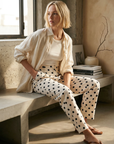 Pantalon fluide à pois noir blanc taille haute