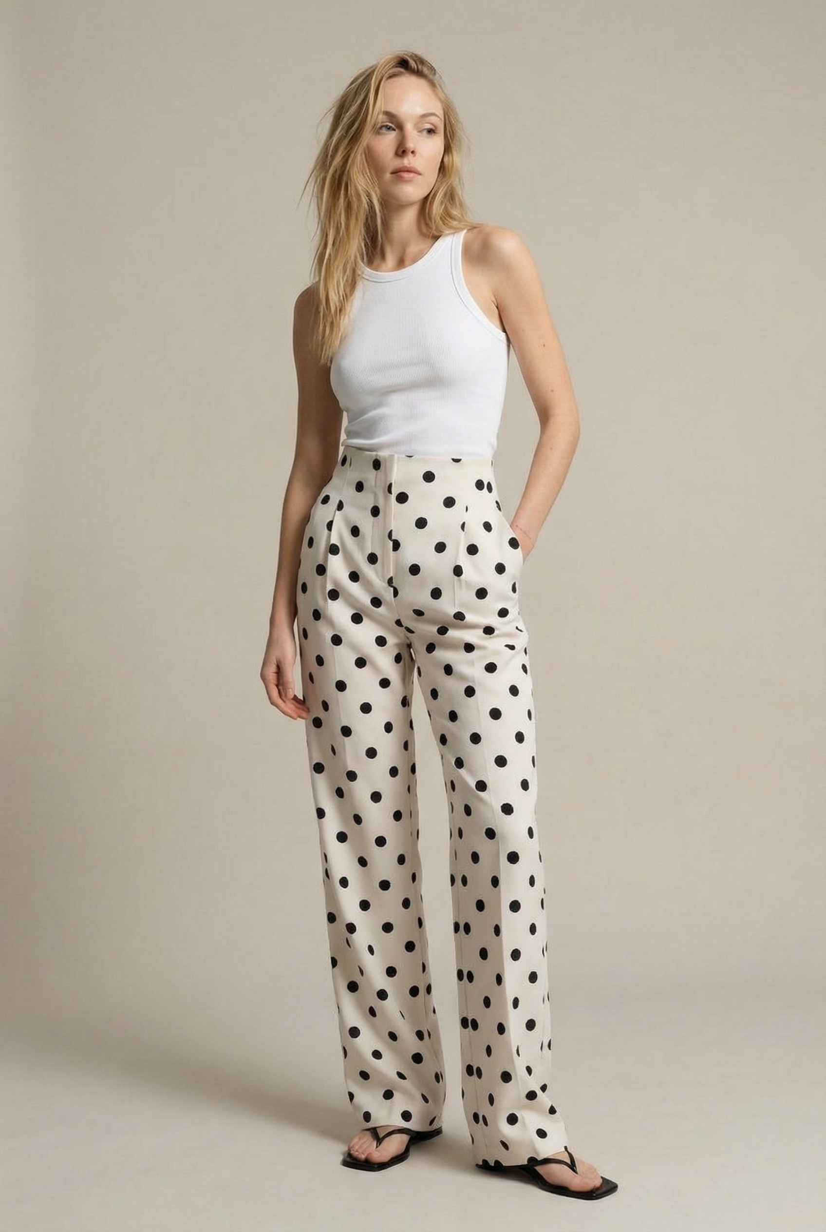 Pantalon fluide à pois noir blanc taille haute