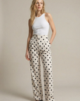 Pantalon fluide à pois noir blanc taille haute