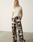 Pantalones anchos para mujer con estampado moderno, cintura elástica cómoda y estilo chic.
