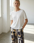 Pantalones anchos para mujer con estampado moderno, cintura elástica cómoda y estilo chic.