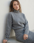 Pull court gris col roulé
