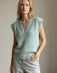 Suéter de punto sin mangas con cuello en V suave y extragrande para mujer: comodidad y versatilidad con estilo.