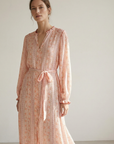 Robe longue fluide imprimée avec ceinture rose