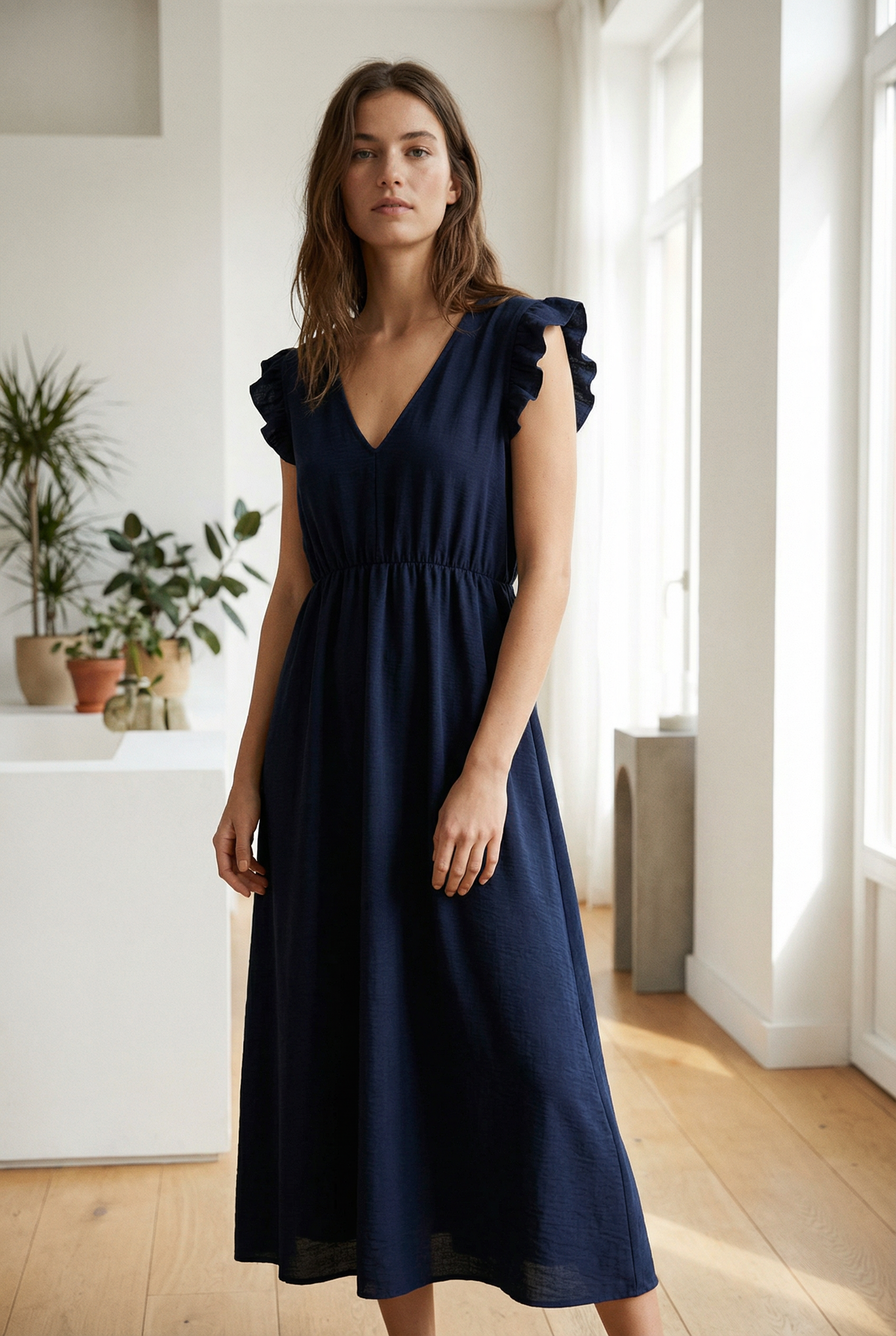 Robe midi fluide V-col sans manches taille élastique