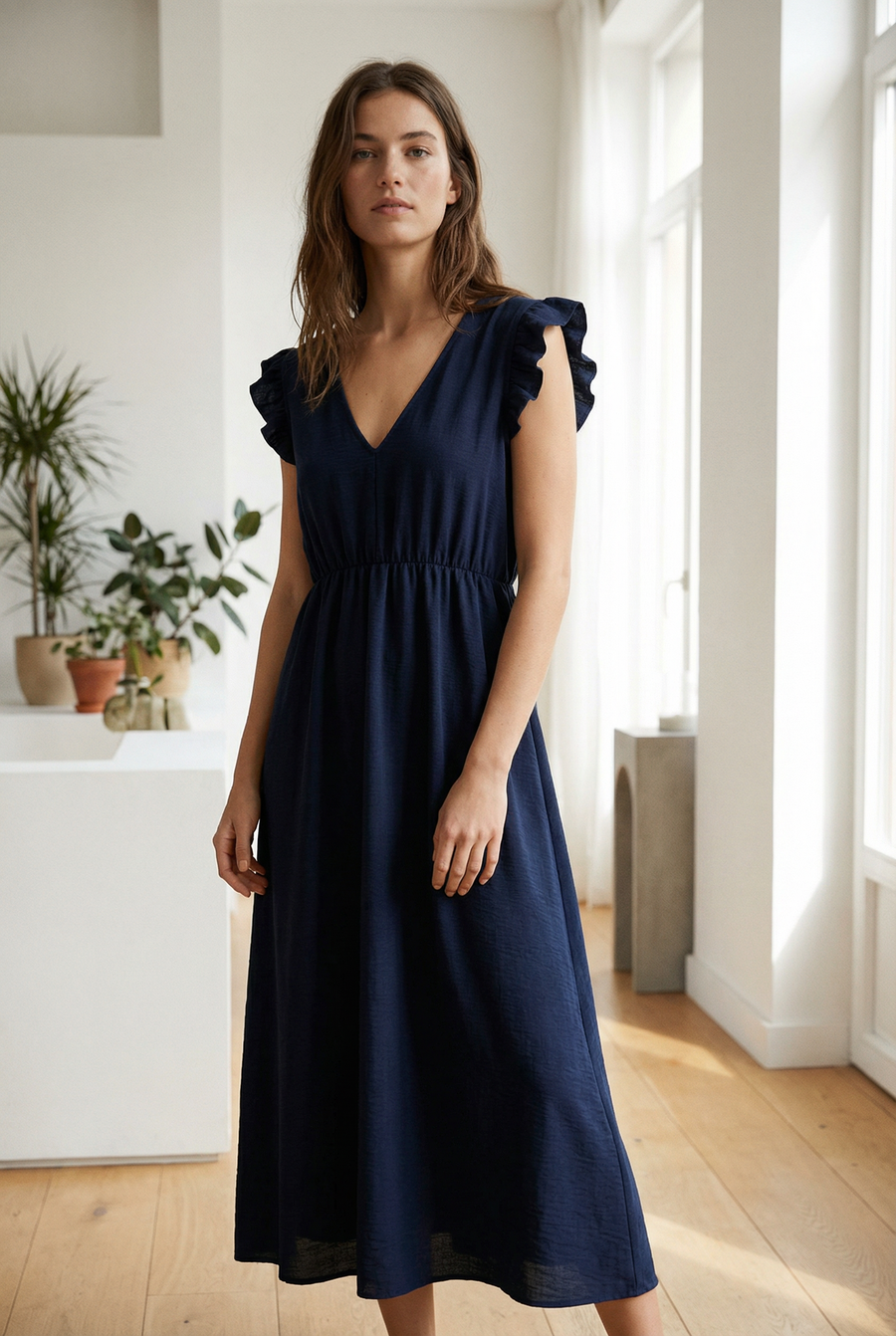 Robe midi fluide V-col sans manches taille élastique