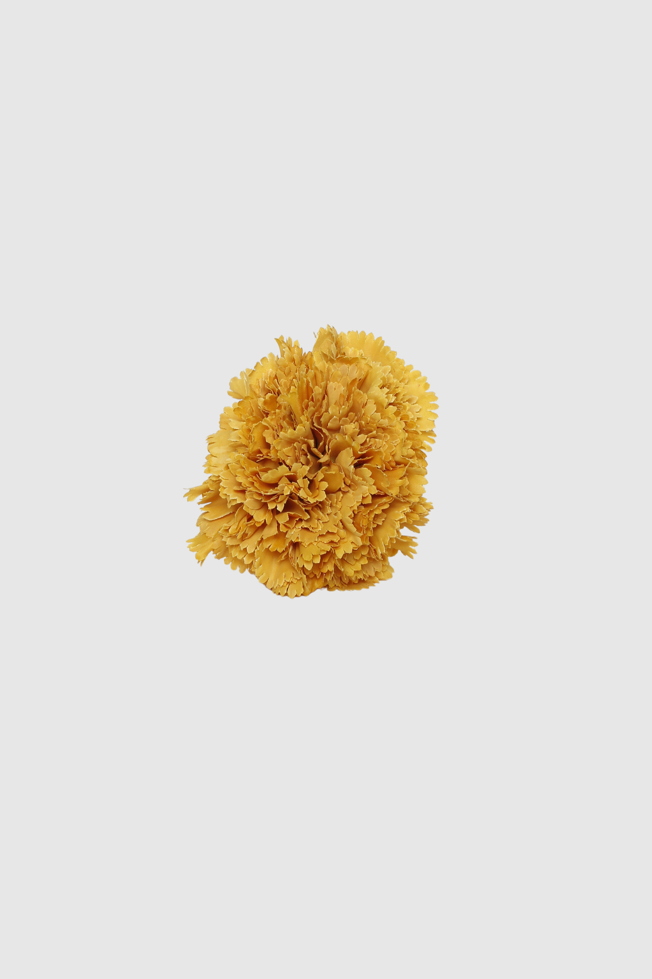 Fleur de coiffure œillet jaune moutarde