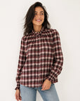 Blouse à carreaux col volanté
