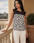 Blouse à pois et dentelle