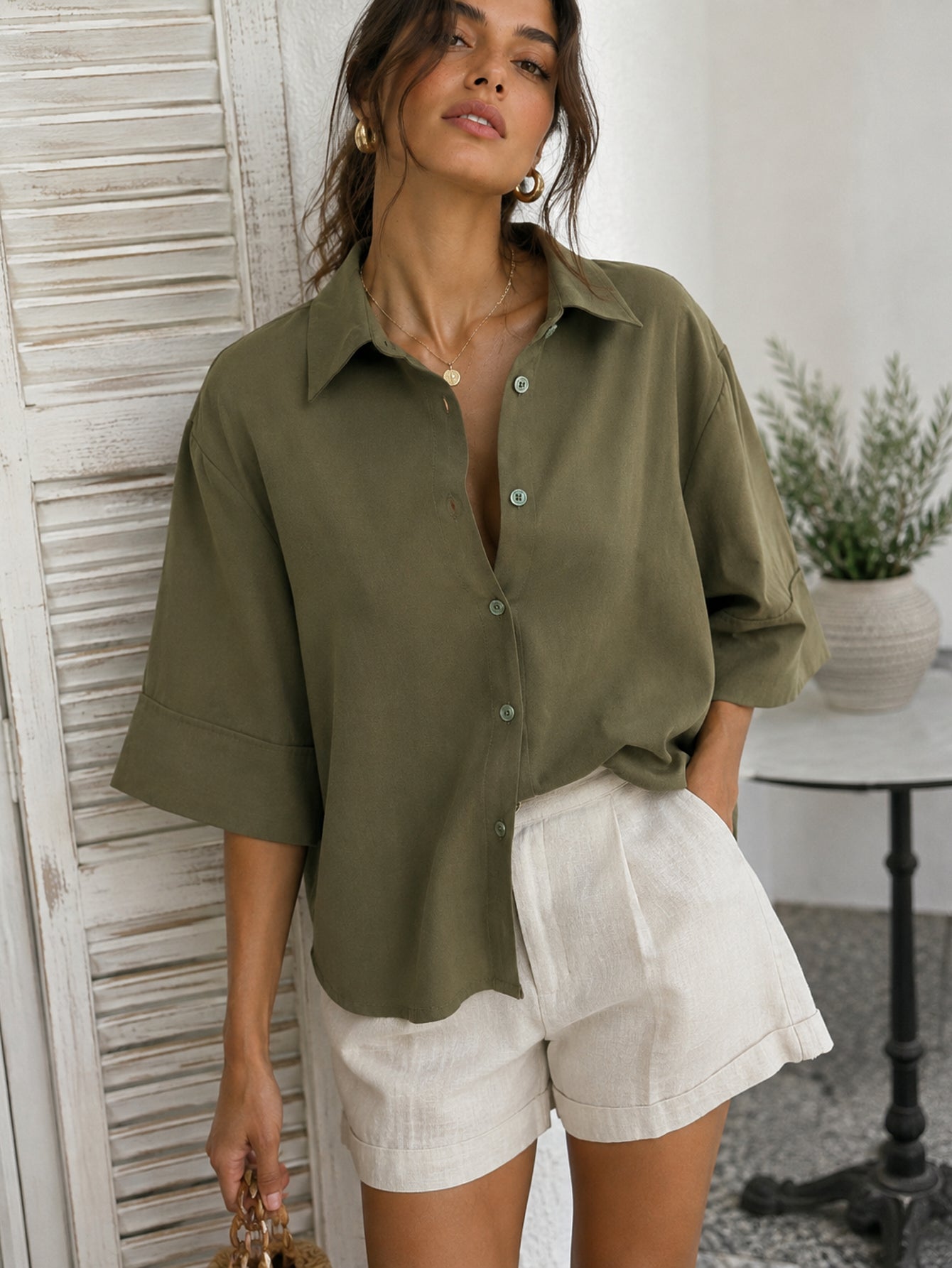 détail boutons blouse kaki