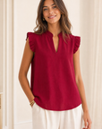 AI blouse debout face