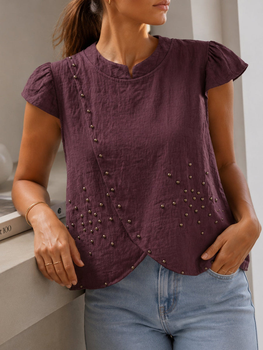 blouse prune portée croisée à clous