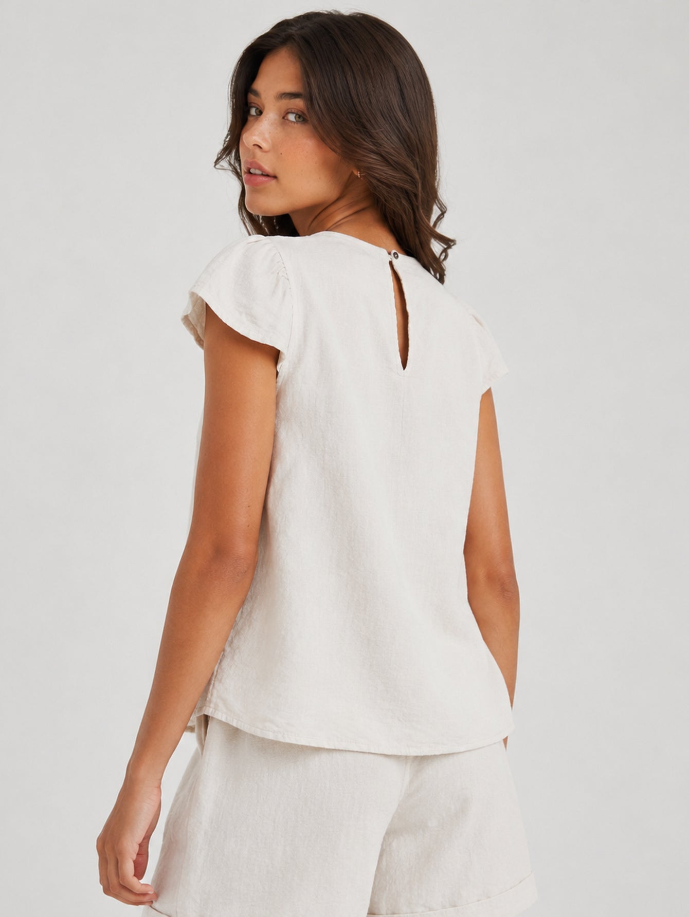 Dos blouse écrue goutte boutonnée