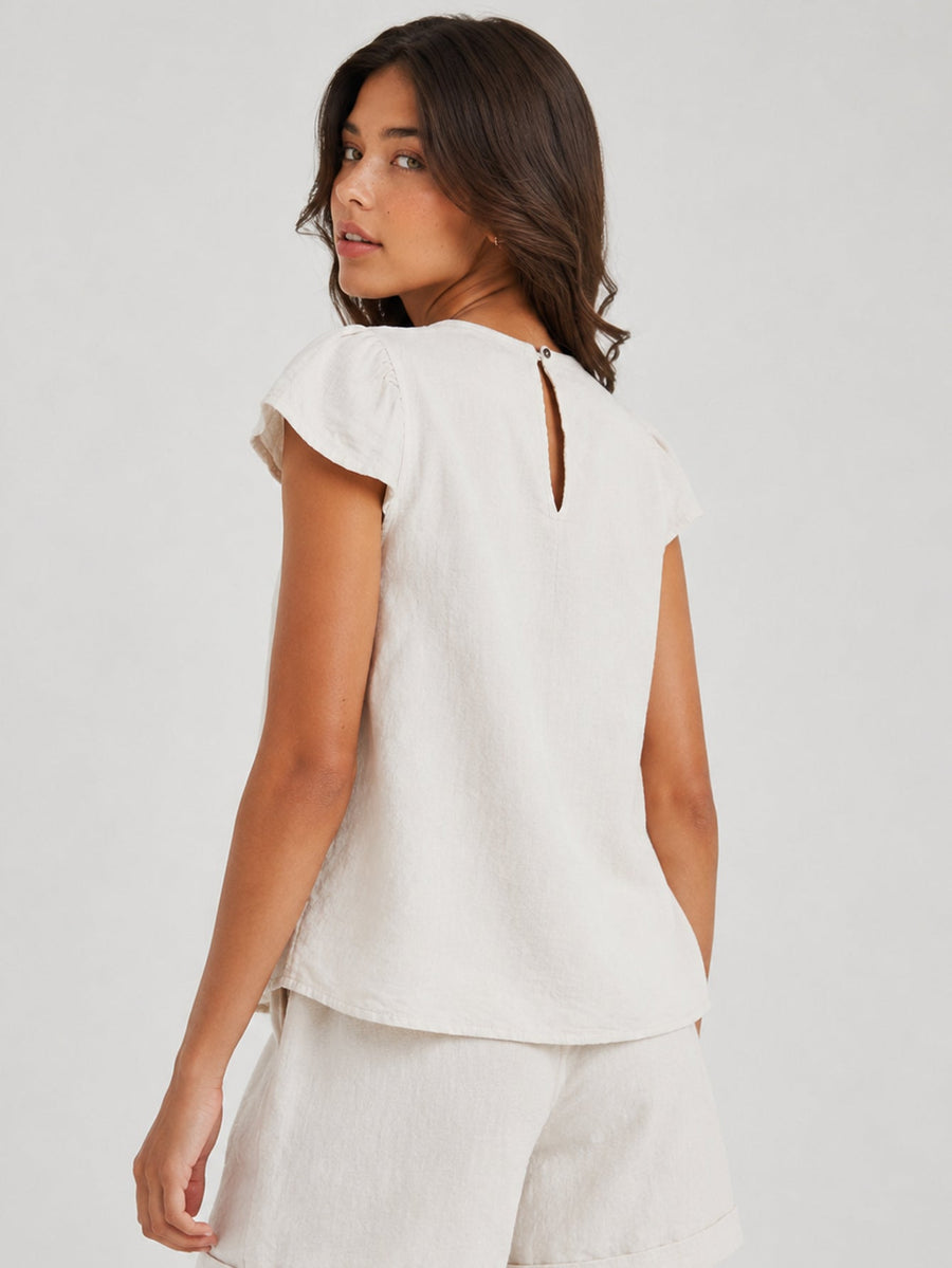 Dos blouse écrue goutte boutonnée