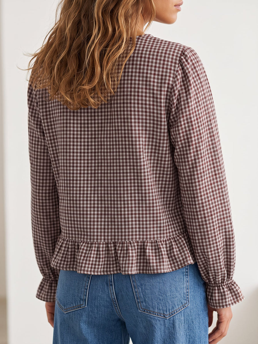 Dos de la blouse vichy brune avec basque