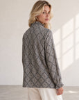 Blouse vichy plumetis à col montant volanté