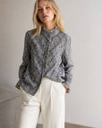 Blouse vichy plumetis à col montant volanté
