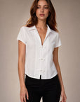 Dos chemise blanche manches courtes