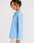 chemise bleu ciel vue de profil manches longues