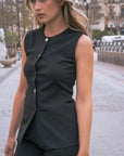 Gilet noir femme sans manches à boutons dorés, style élégant et tendance