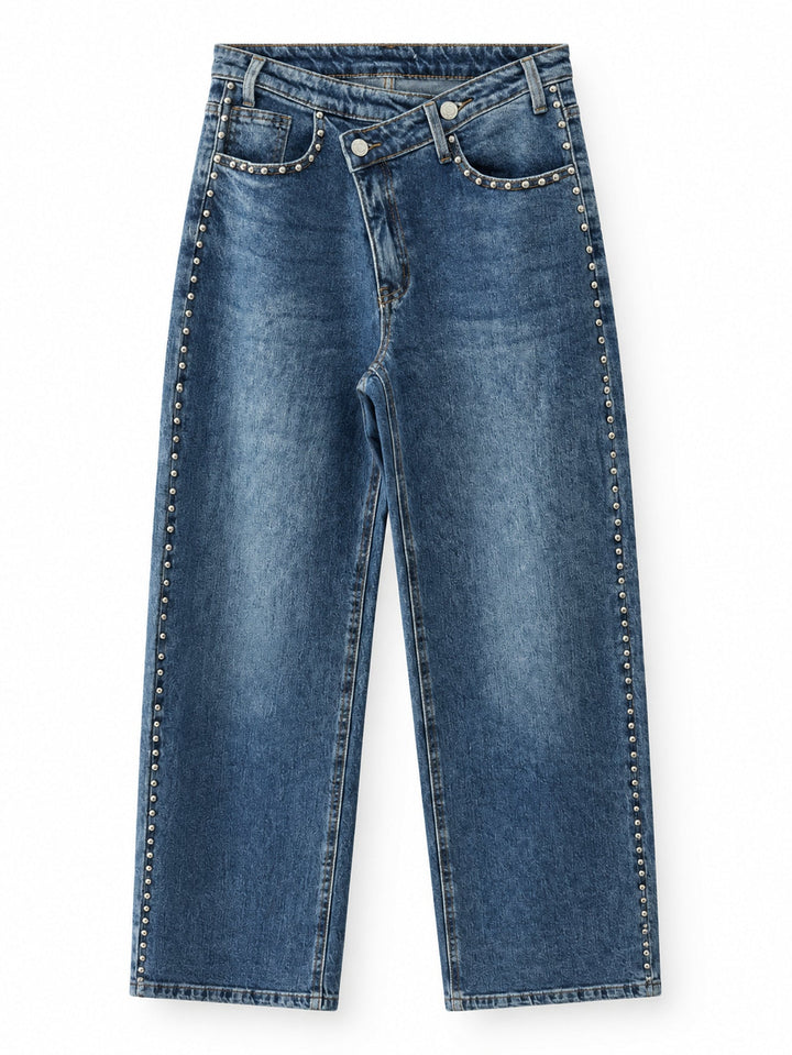 Jean large bleu à ceinture croisée et rivets
