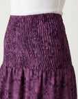 Gros plan smocks jupe violette