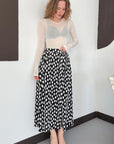 top13837 jupe evasee midi a pois noire avec taille haute image 1