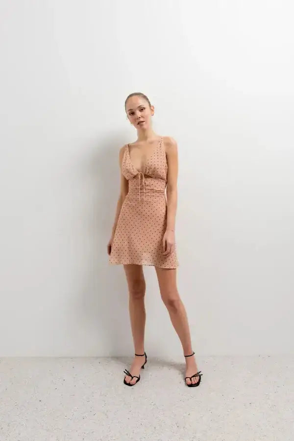 Mini robe imprimée à pois décolleté plongeant