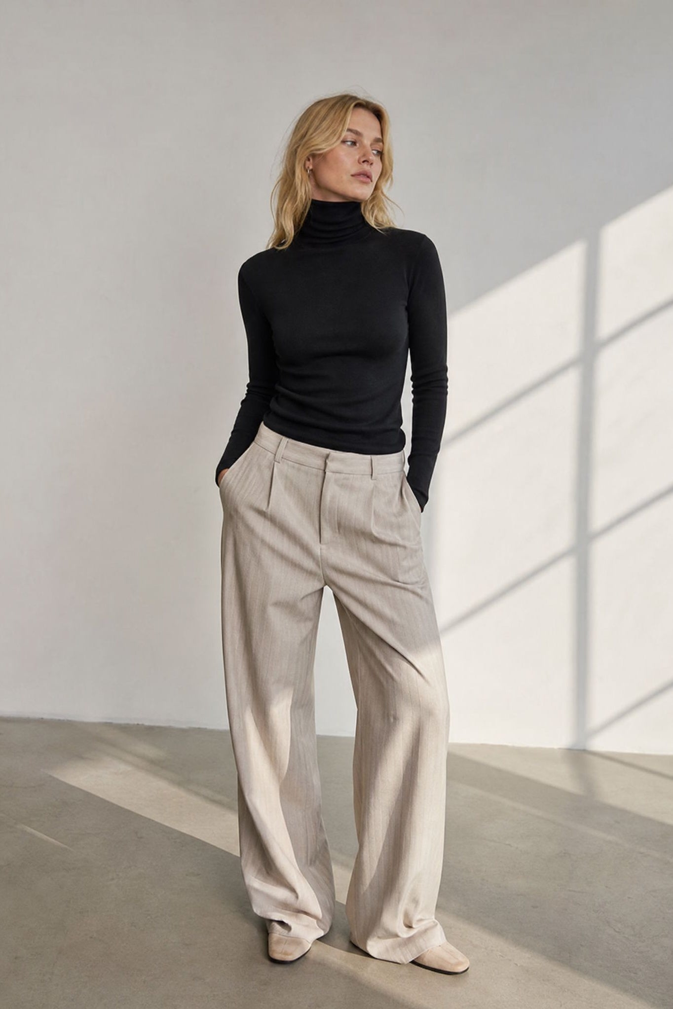 Pantalon à pinces rayé