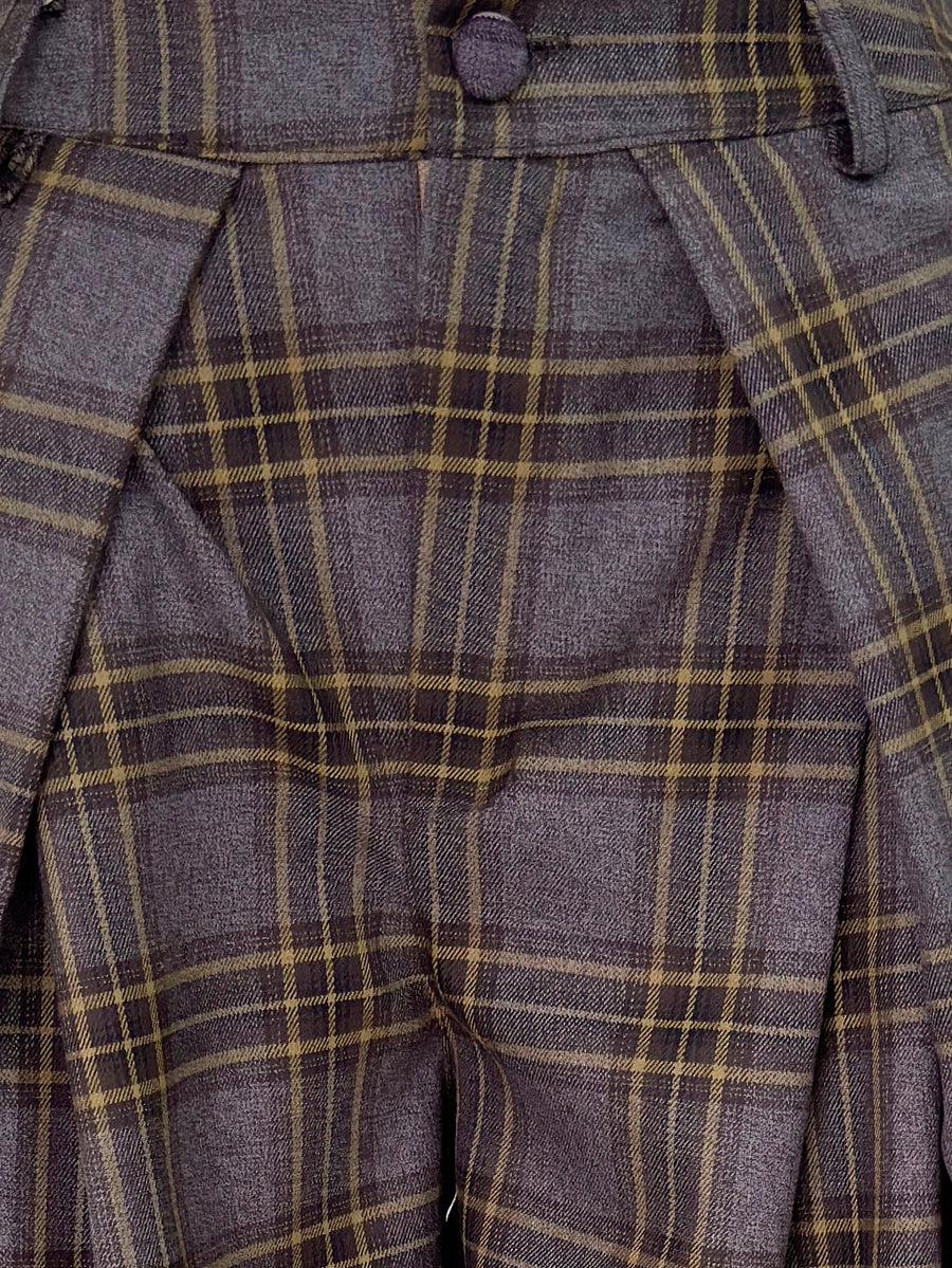 pantalon à carreaux bouton recouvert