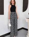 top13831 pantalon palazzo noir elegant a taille haute et motif a pois image 1