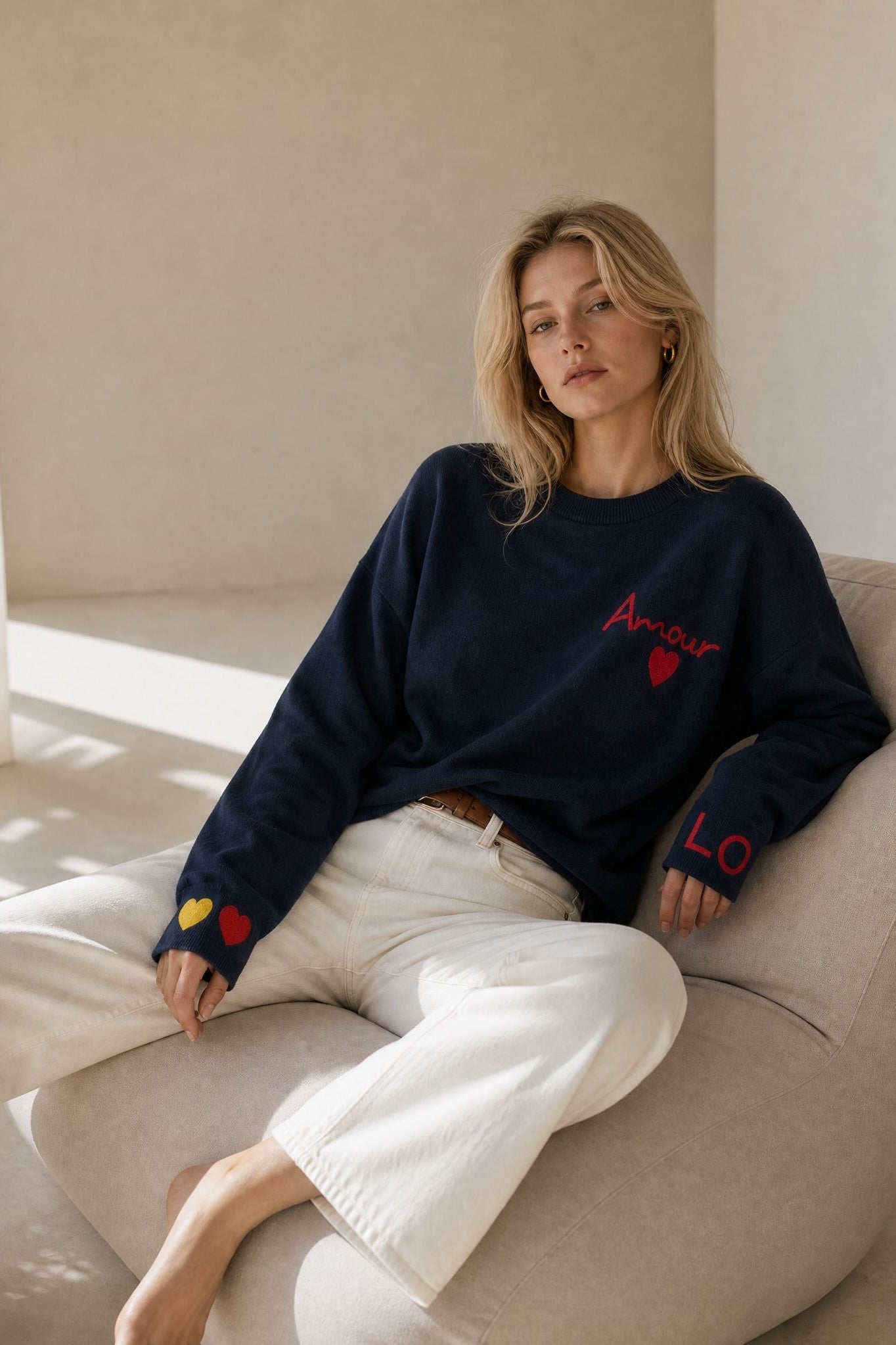Pull en maille bleu nuit dos cœur