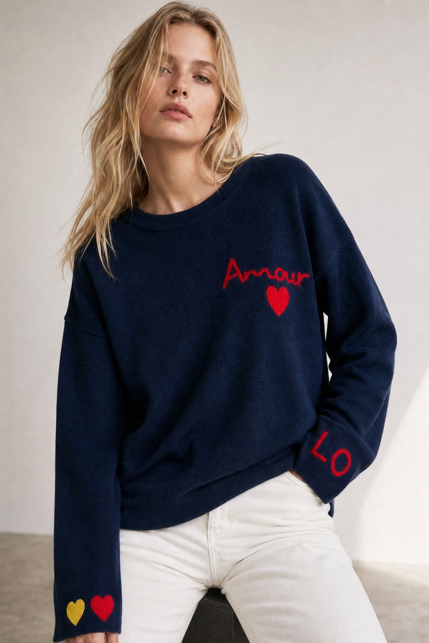 Pull en maille bleu nuit dos cœur
