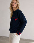 Pull en maille bleu nuit dos cœur