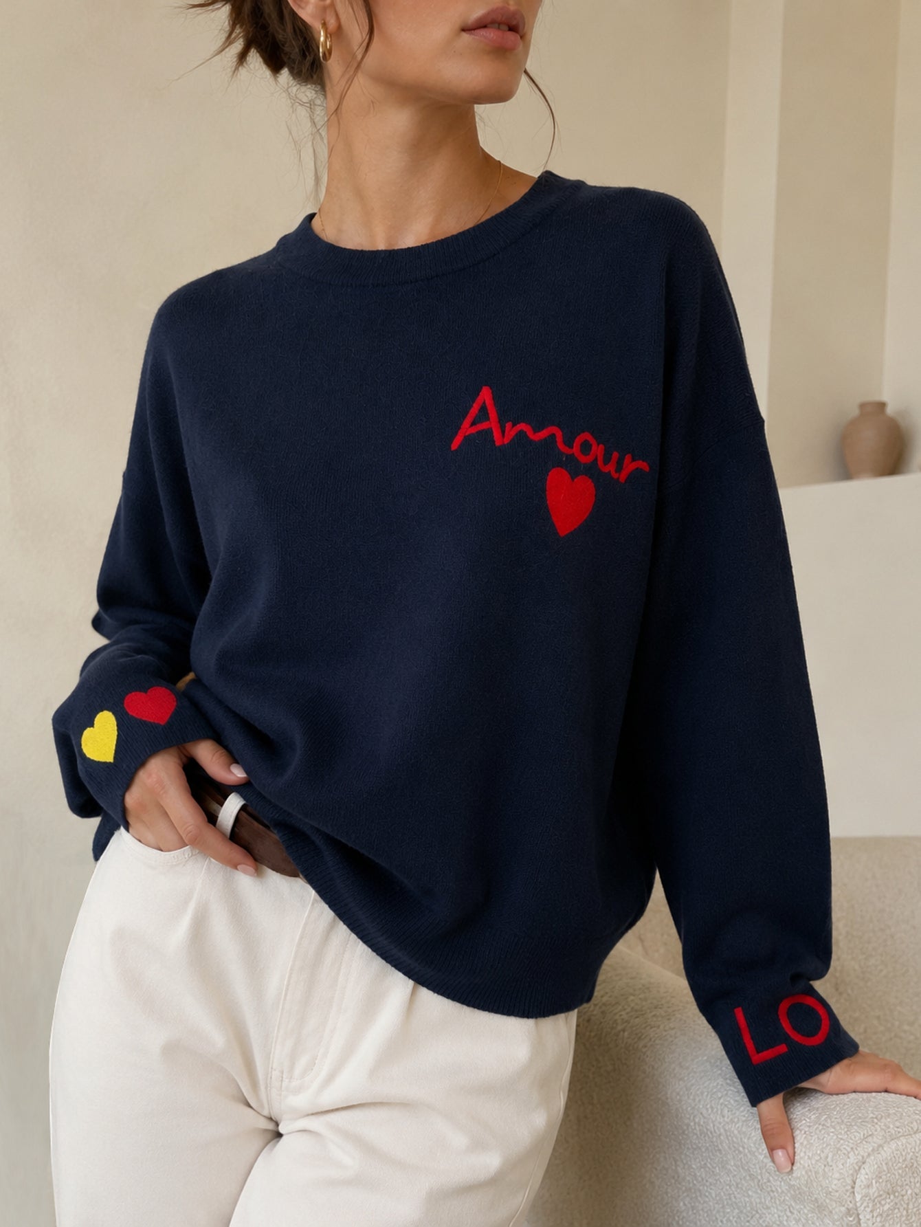 Pull en maille bleu nuit avec bords côtes
