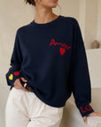 Pull en maille bleu nuit avec bords côtes