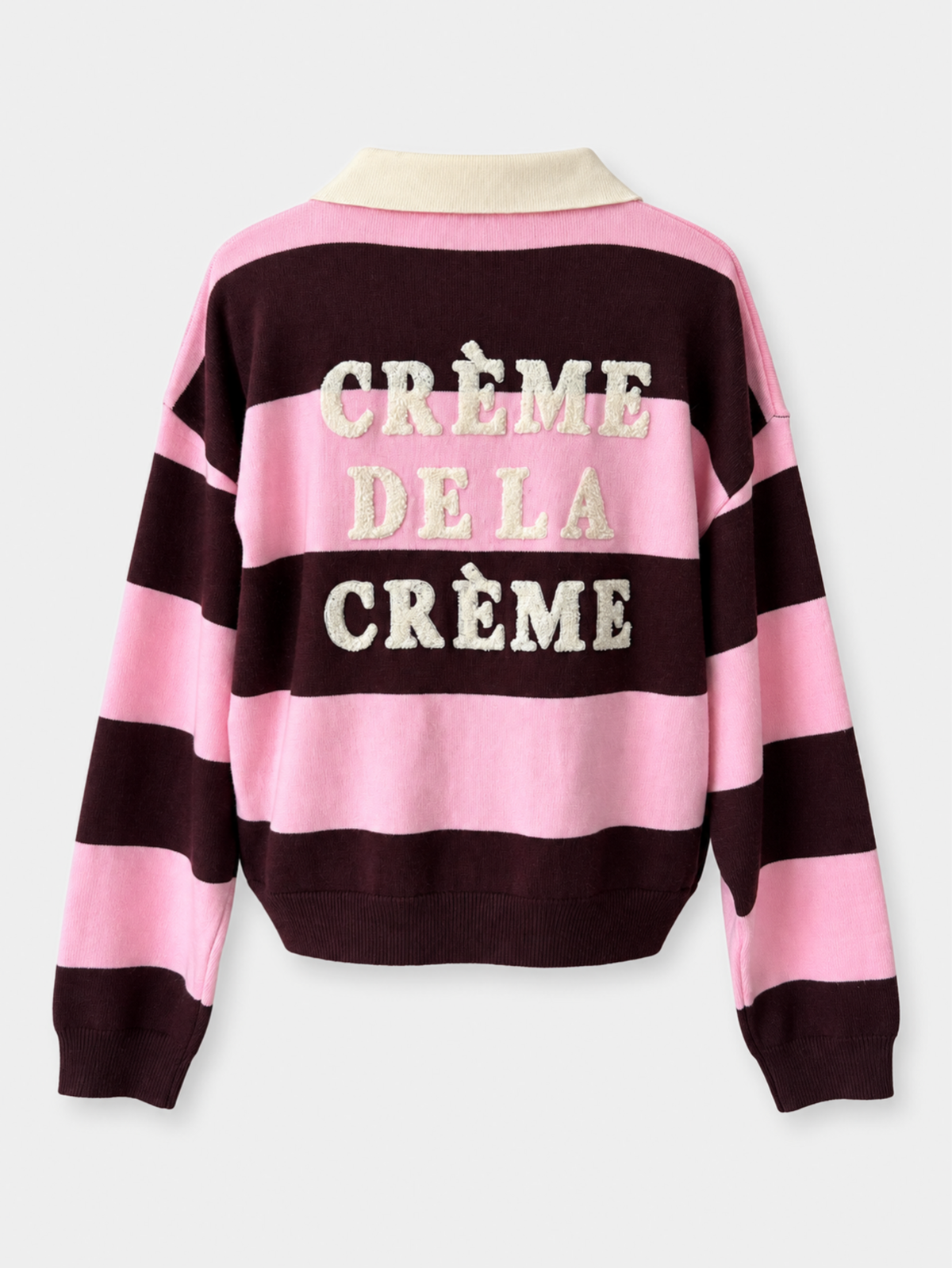 Dos du pull rose bordeaux à message bouclette « CRÈME DE LA CRÈME »