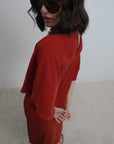 dos de la robe rouge avec ouverture goutte