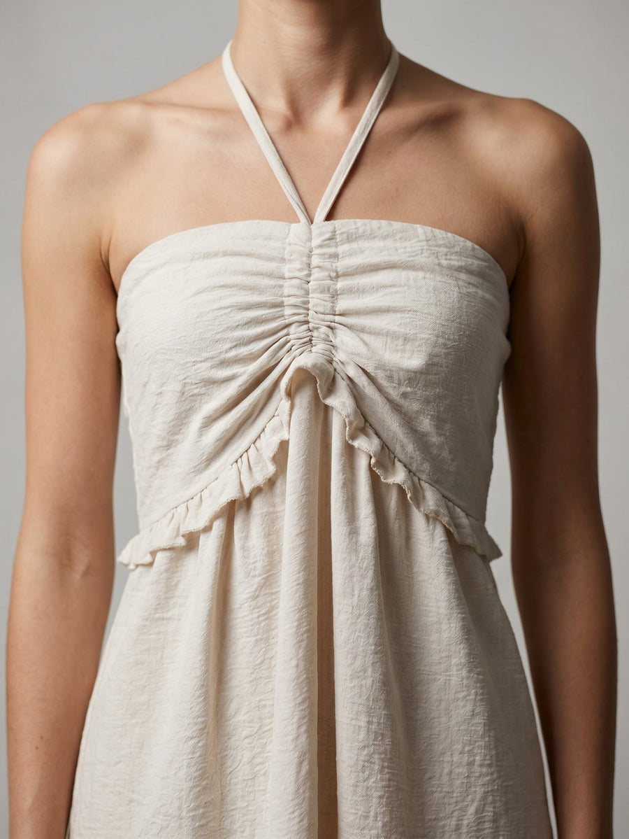 Détail bustier froncé beige
