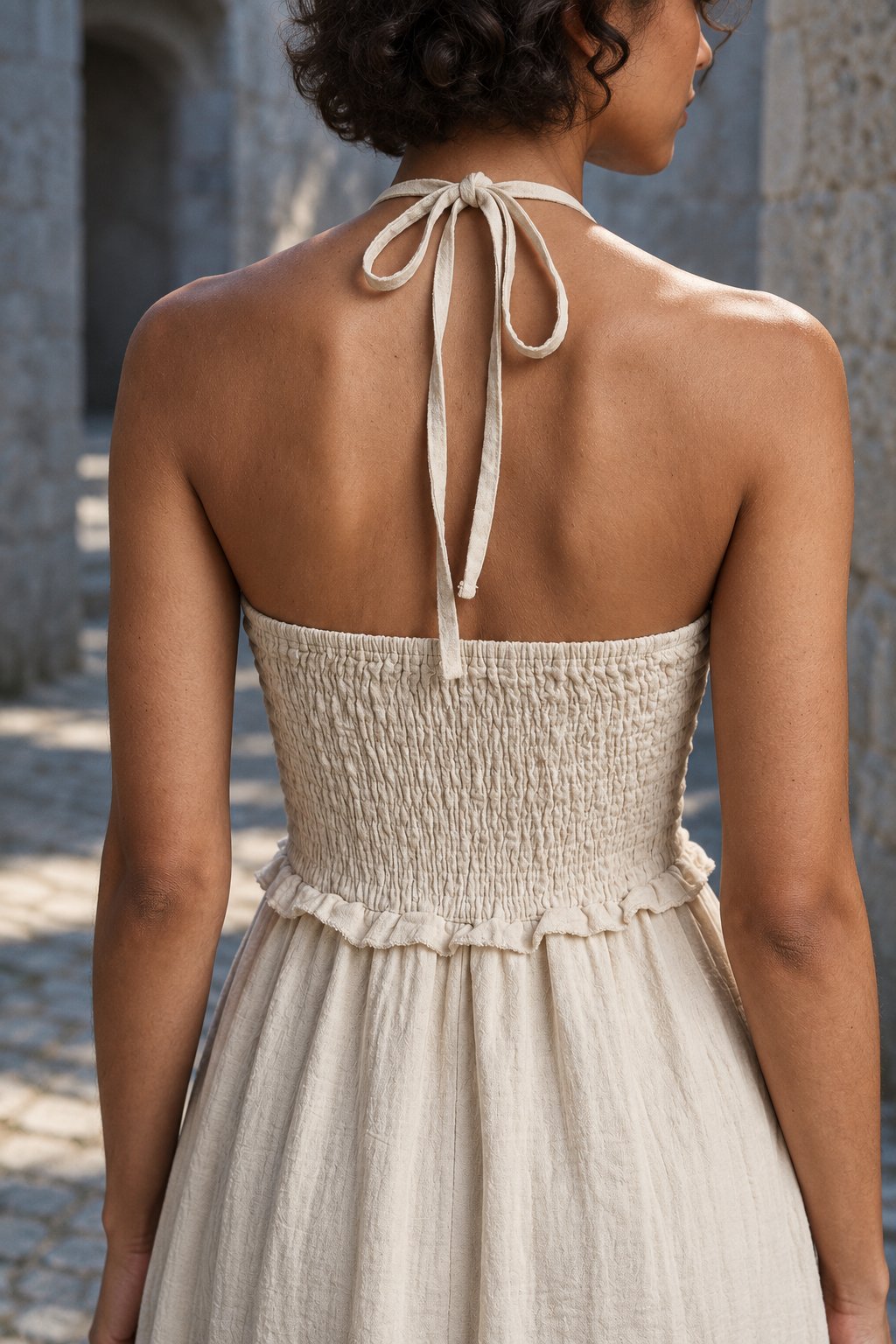 Détail dos smocké beige