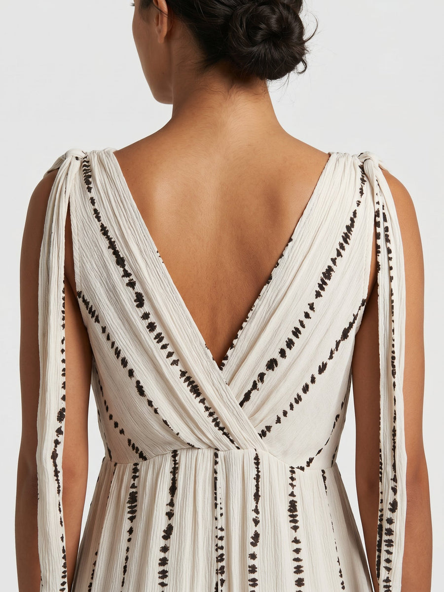 robe dos en V croisé détail beige