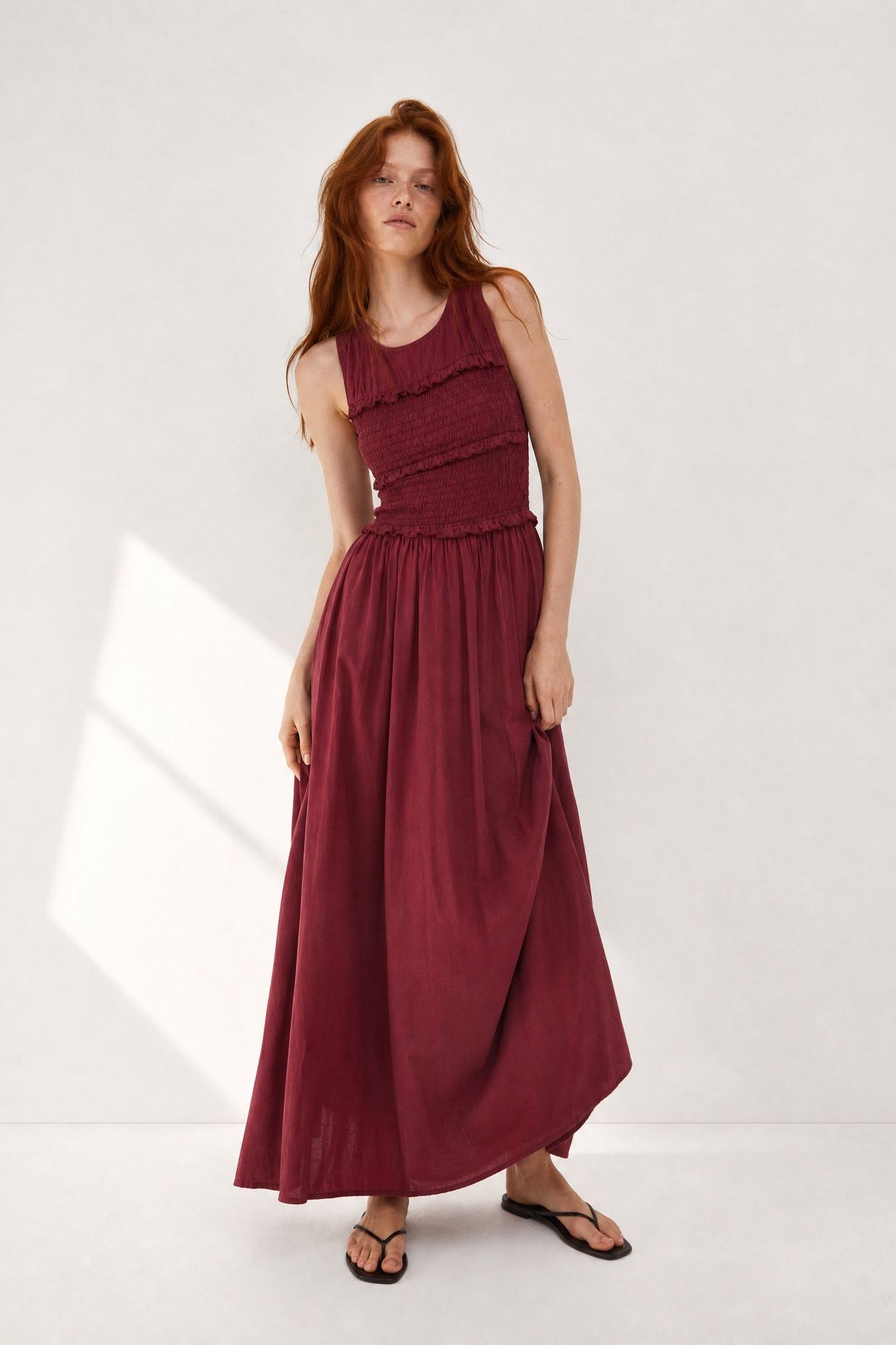 Robe midi fluide à buste smocké