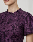 Dos goutte d’eau robe violette