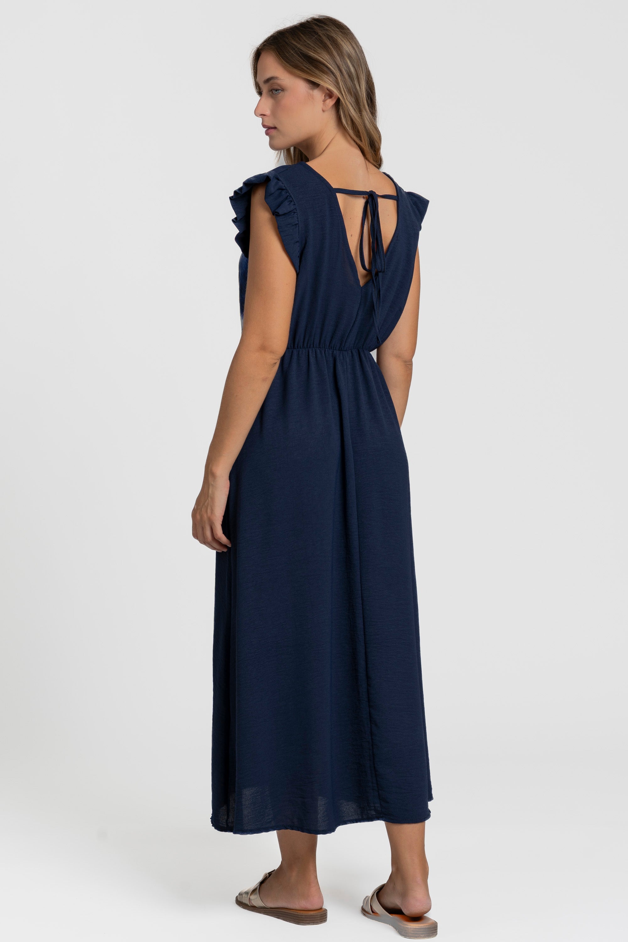 Robe midi fluide V-col sans manches taille élastique Italie, modèle bleu marine vue de dos.