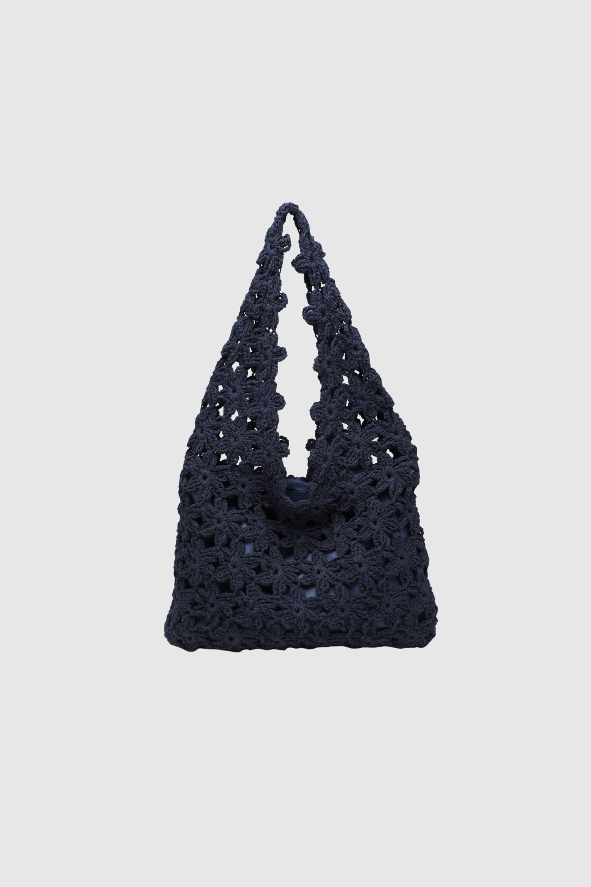 Sac bleu nuit en crochet fleuri avec anse intégrée, vue de face