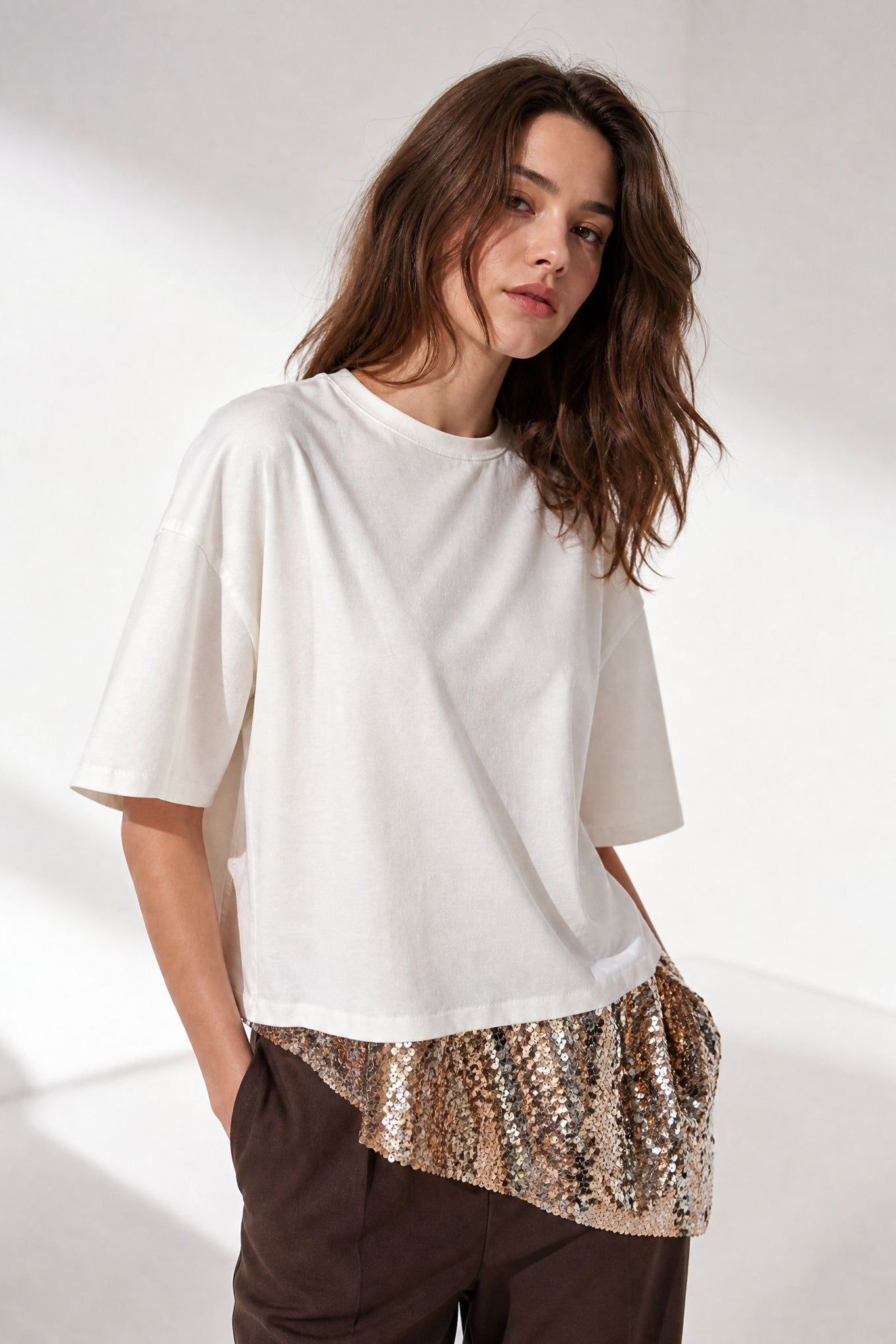 Top crème à sequins coupe ample
